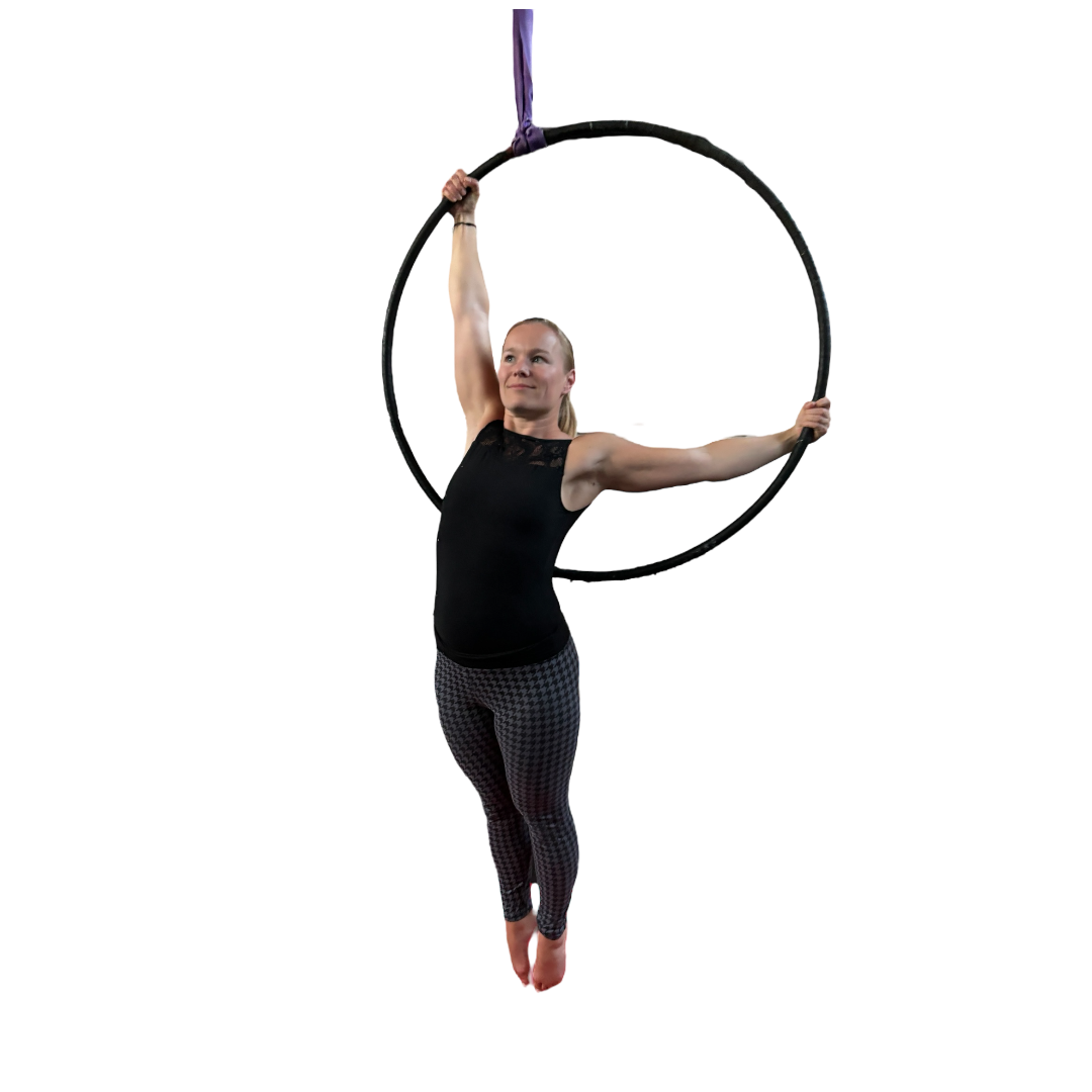 Aerialist in a split on the hoop